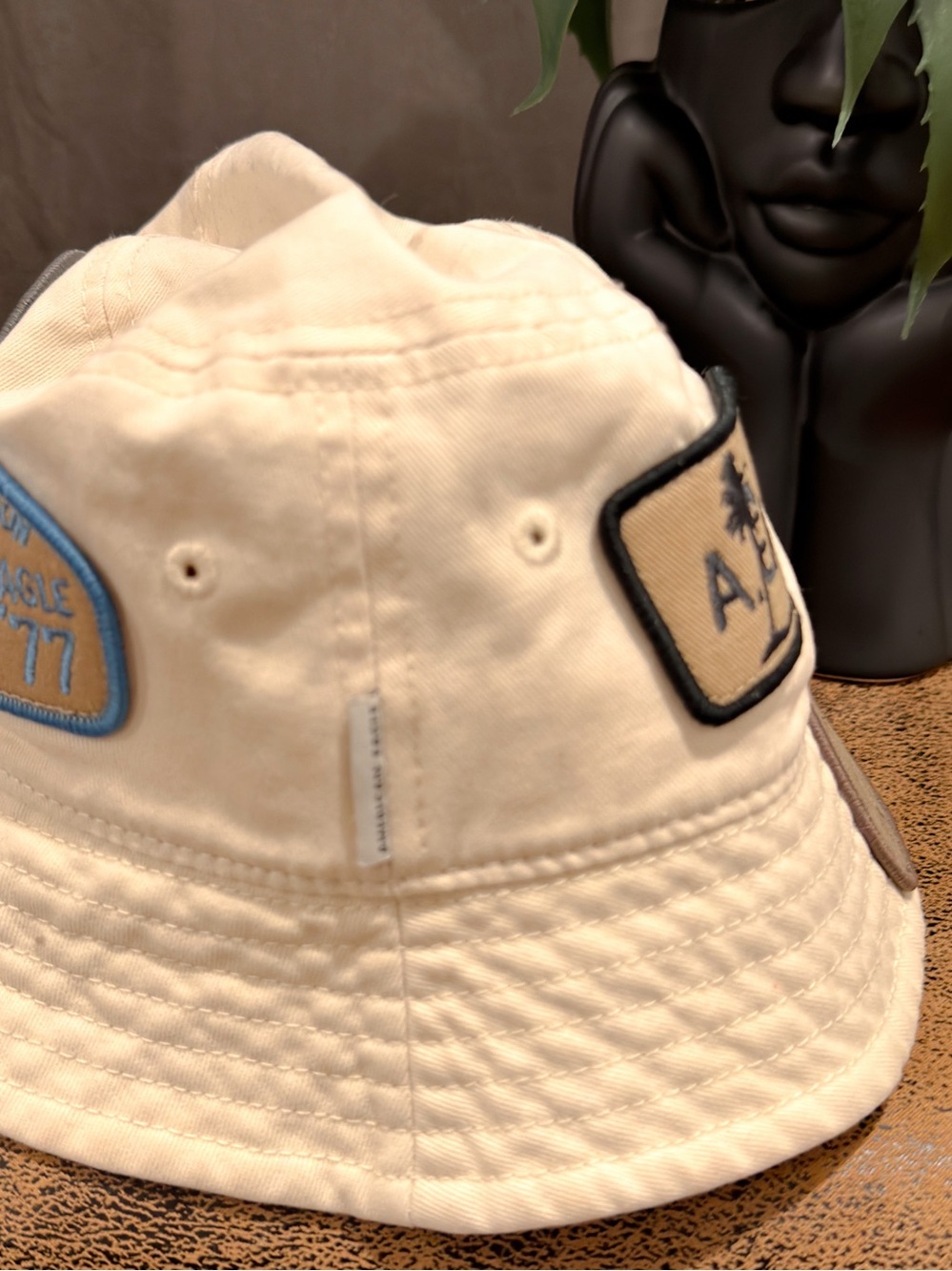 American Eagle Outfitters Cream Bucket Hat with Patch Accents